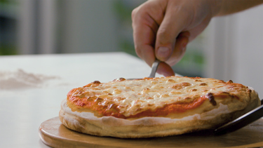Learn how to make thick crust pizza or pan pizza that is made popular by quick serving pizza restaurants. A typical pan pizza is loved for its generous amount of toppings and mozzarella cheese that has a good stretch. In this video, Chef Francisco Crispo uses Arla Pro Perfect Freeze Mozzarella to achieve the perfect cheese stretch for the pizza.