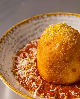 ”One big delicious ball of Risotto please Garçon!” This Oversized Mozzarella-Stuffed Arancini is made for menus: golden,...