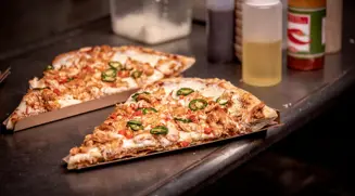 https://cdn.arlapro.com/4a7f02/globalassets/arlapro/uk/the-latest-pizza-burger-trends/4922679_23580_arla-pizzaburgertrends_top-slider-1_bytheslice_1500x828pxx.jpg