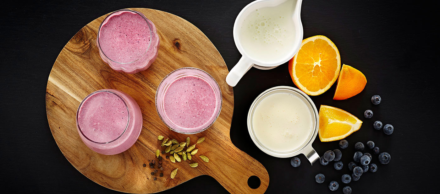 Orange and buttermilk smoothie with blueberries